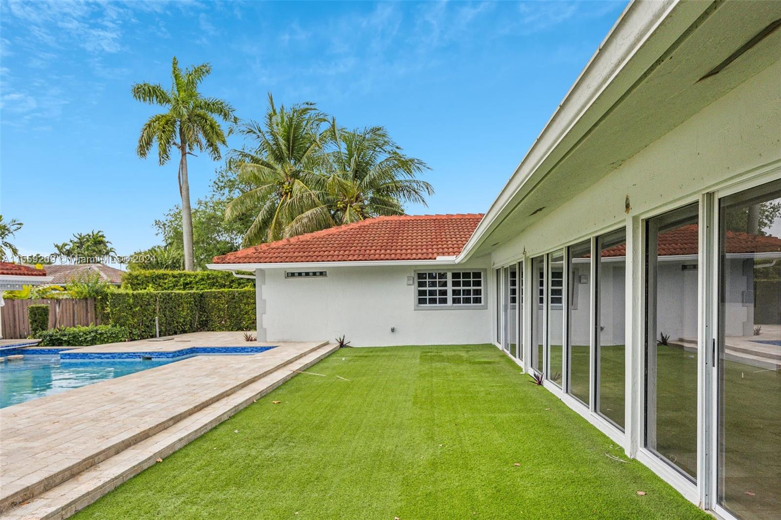 10240 Southwest 124th Street Miami, FL 33176 - Photo 39 of 81 a house with swimming pool in front of it