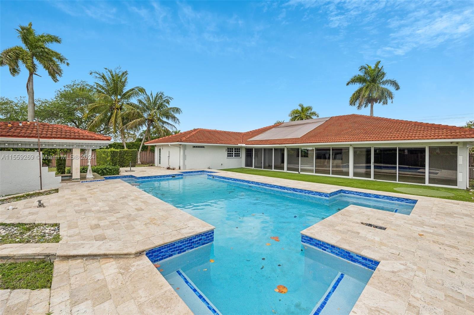 10240 Southwest 124th Street Miami, FL 33176 - Photo 42 of 81 a view of house with swimming pool outdoor seating
