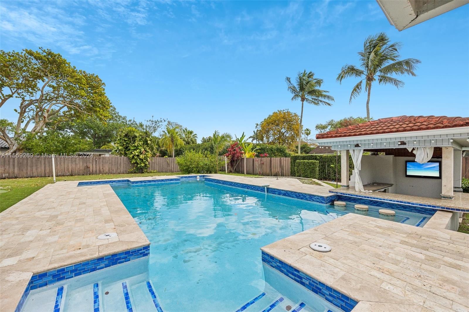 10240 Southwest 124th Street Miami, FL 33176 - Photo 52 of 81 a view of a swimming pool with a patio