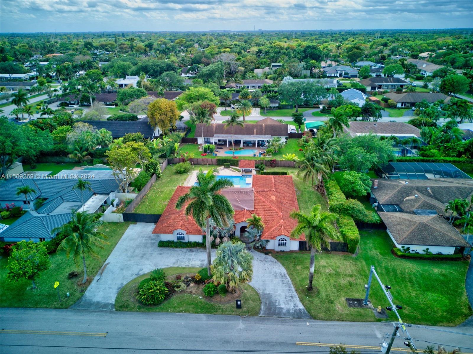10240 Southwest 124th Street Miami, FL 33176 - Photo 58 of 81 an aerial view of residential house with outdoor space and swimming pool