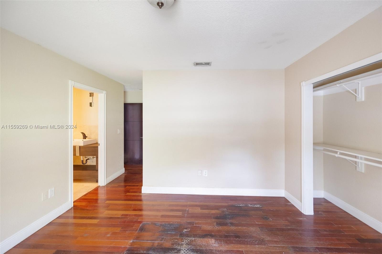 10240 Southwest 124th Street Miami, FL 33176 - Photo 68 of 81 a view of an empty room with wooden floor