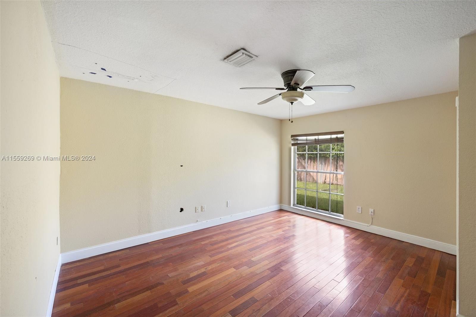 10240 Southwest 124th Street Miami, FL 33176 - Photo 75 of 81 wooden floor in an empty room with a window