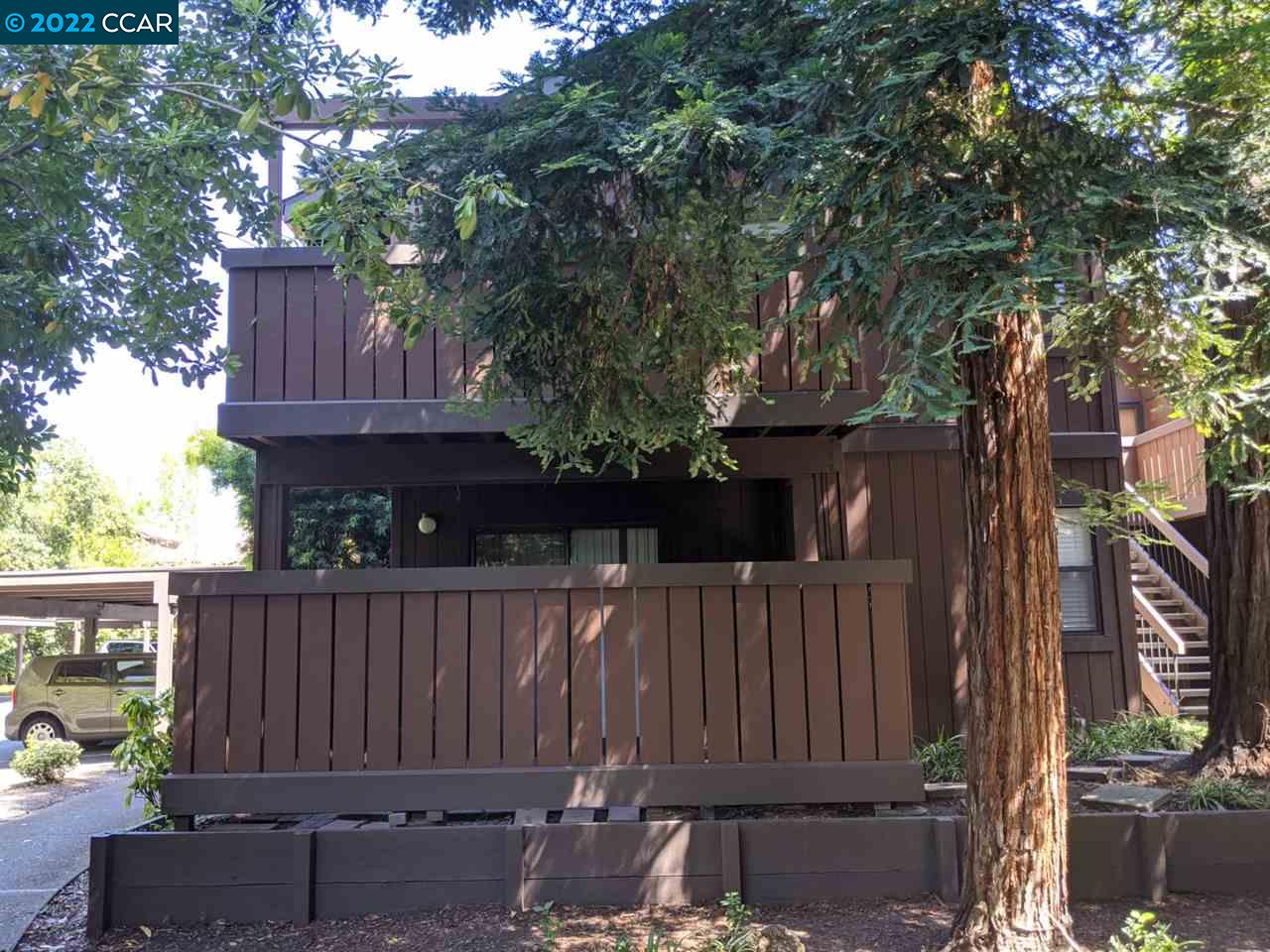 a view of outdoor space with fenced and wooden fence