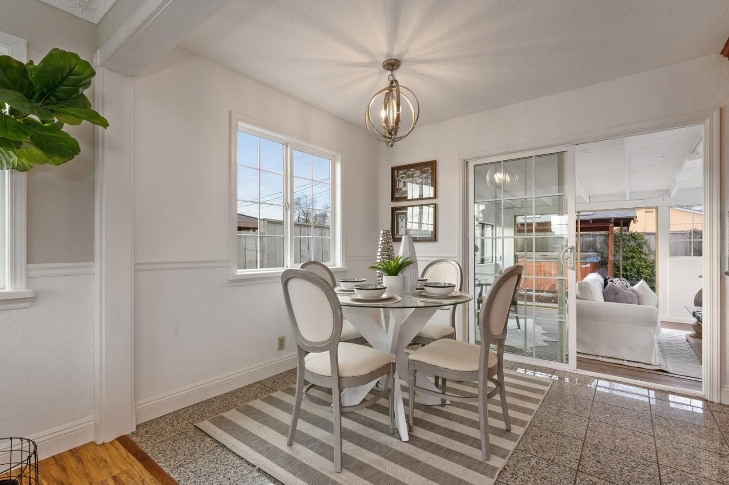 1849 Girard Drive Milpitas, CA 95035 - Photo 12 of 33 a view of a dining room with furniture window and outside view