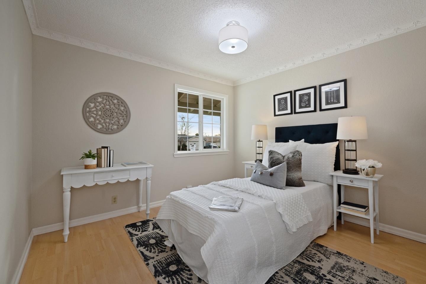 1849 Girard Drive Milpitas, CA 95035 - Photo 19 of 33 a bedroom with a bed and a table