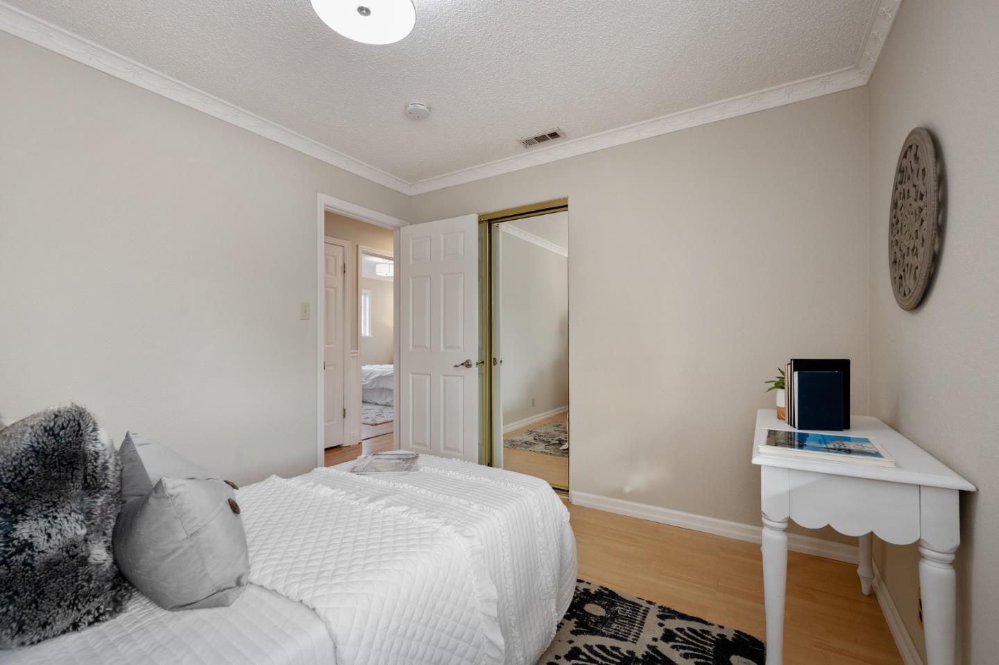 1849 Girard Drive Milpitas, CA 95035 - Photo 20 of 33 a bedroom with a bed and a window