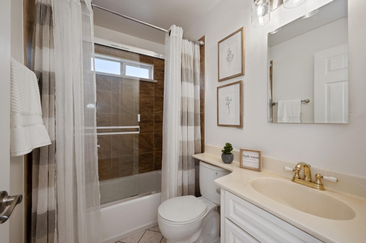 1849 Girard Drive Milpitas, CA 95035 - Photo 21 of 33 a bathroom with a sink toilet and shower