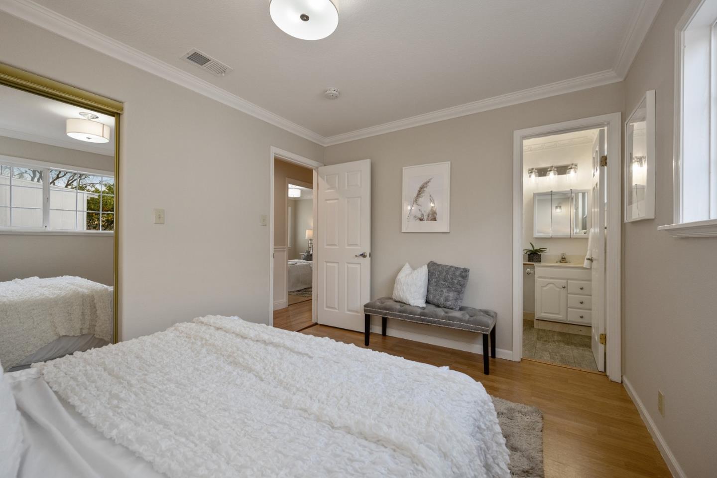 1849 Girard Drive Milpitas, CA 95035 - Photo 23 of 33 a bedroom with a bed and a table