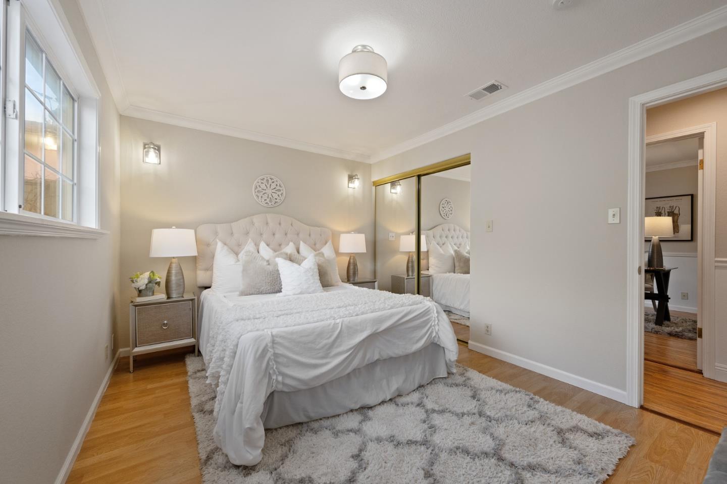 1849 Girard Drive Milpitas, CA 95035 - Photo 25 of 33 a bedroom with a bed and a view of bathroom