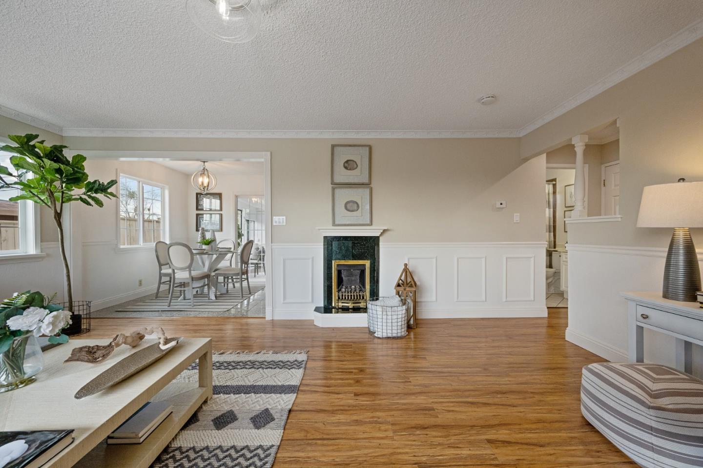 1849 Girard Drive Milpitas, CA 95035 - Photo 6 of 33 a living room with furniture and a fireplace