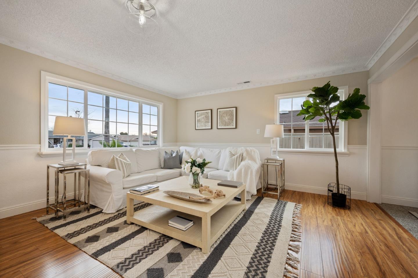 1849 Girard Drive Milpitas, CA 95035 - Photo 7 of 33 a living room with furniture and a wooden floor