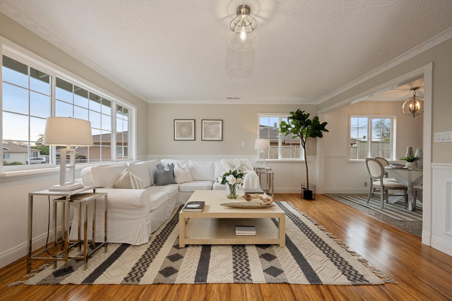 1849 Girard Drive Milpitas, CA 95035 - Photo 8 of 33 a living room with furniture and a rug