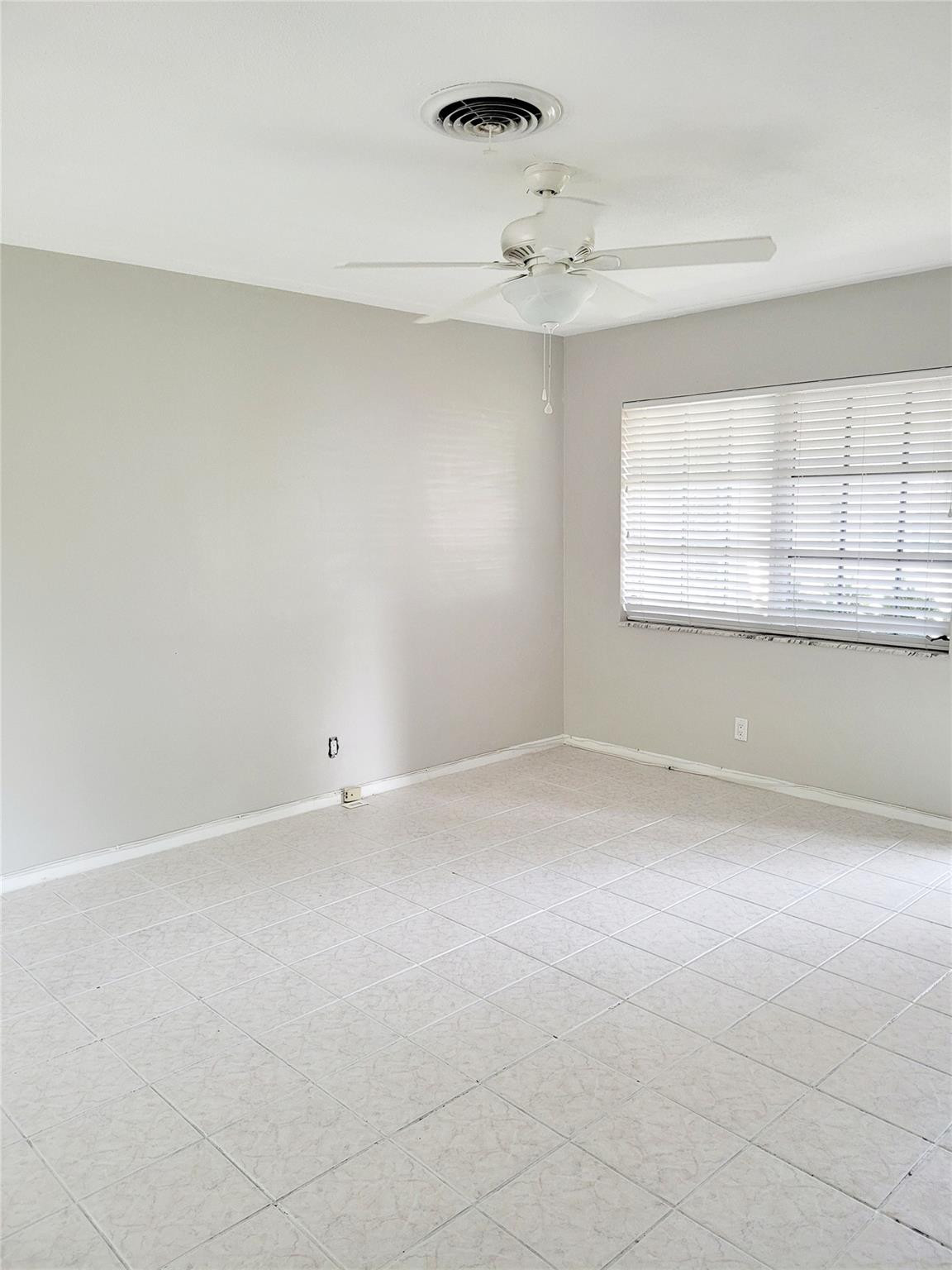 2120 Northeast 41st Street, Unit C Lighthouse Point, FL 33064 - Photo 13 of 18 Spacious and bright living room