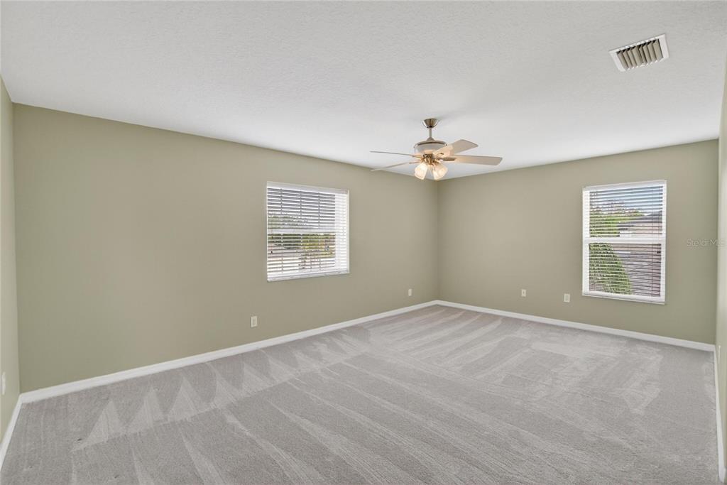 11543 Addison Chase Drive Riverview, FL 33579 - Photo 23 of 45 a view of an empty room with a window