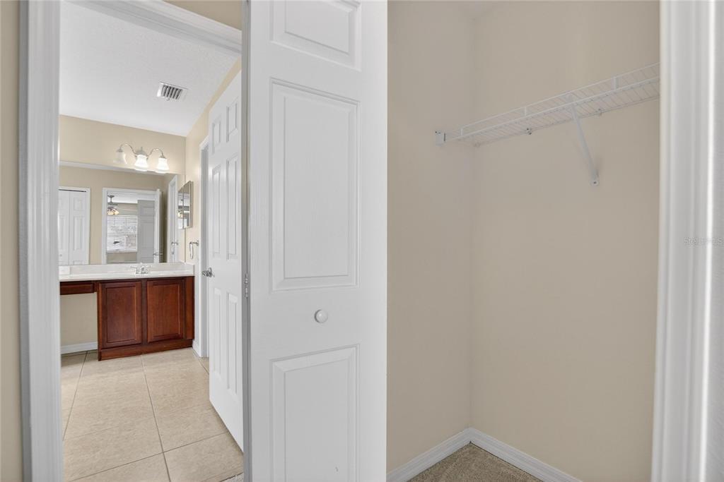 11543 Addison Chase Drive Riverview, FL 33579 - Photo 24 of 45 a view of an empty room and fire place