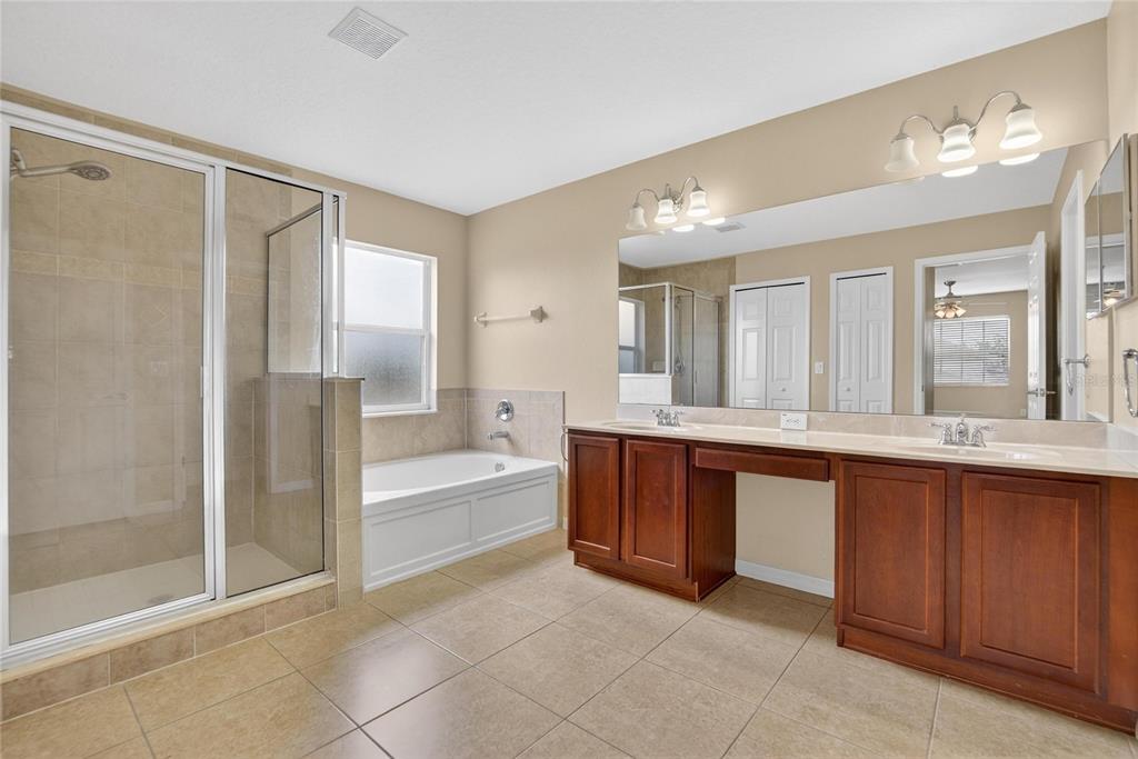 11543 Addison Chase Drive Riverview, FL 33579 - Photo 25 of 45 a spacious bathroom with a tub shower and sink