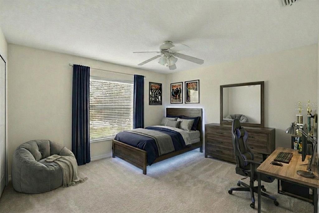 11543 Addison Chase Drive Riverview, FL 33579 - Photo 28 of 45 a living room with furniture and a window