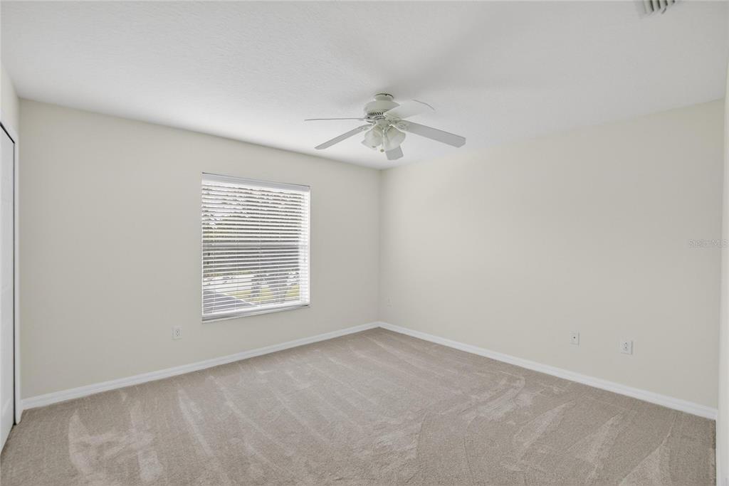 11543 Addison Chase Drive Riverview, FL 33579 - Photo 29 of 45 an empty room with a window
