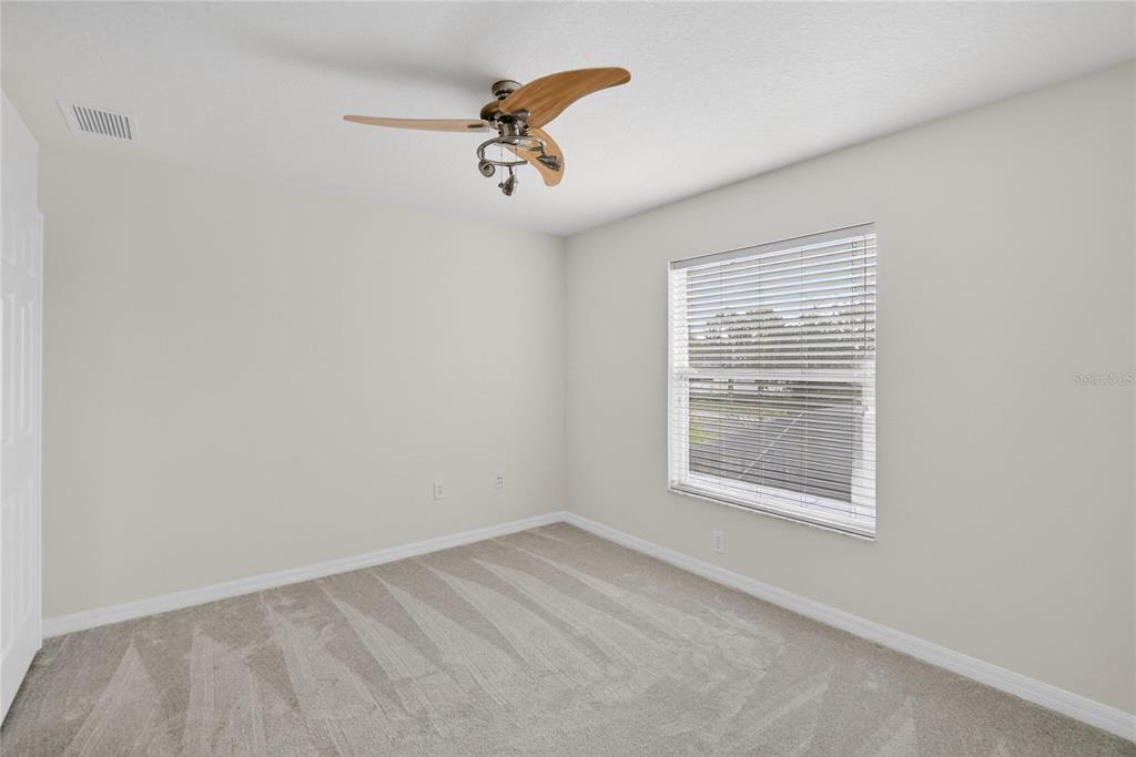 11543 Addison Chase Drive Riverview, FL 33579 - Photo 36 of 45 an empty room with a window