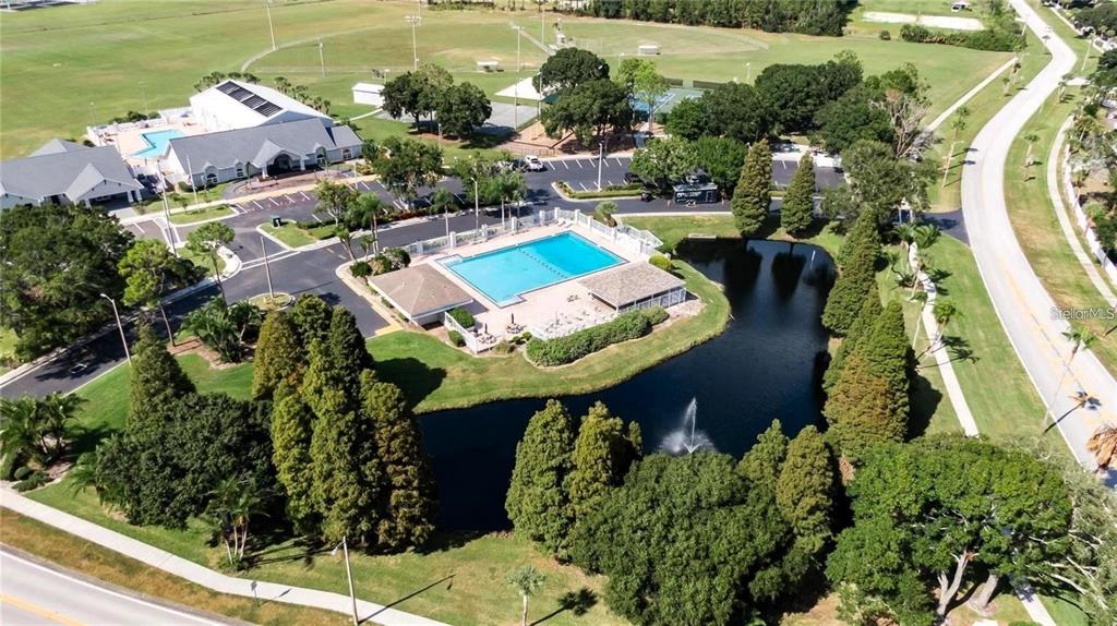 11543 Addison Chase Drive Riverview, FL 33579 - Photo 43 of 45 an aerial view of a house with a garden and lake view
