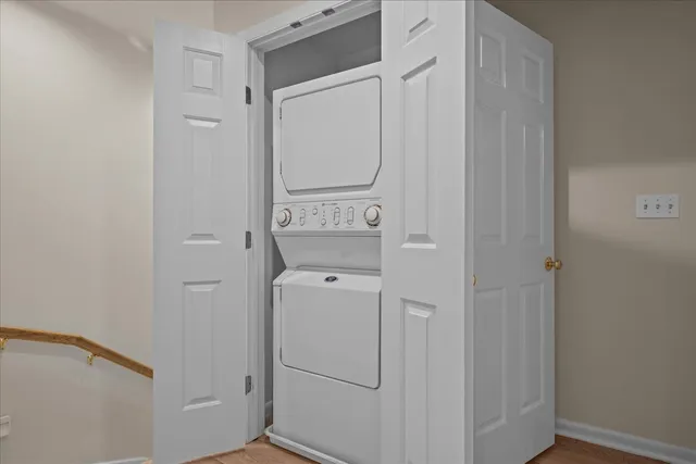 a view of bathroom with washer and dryer