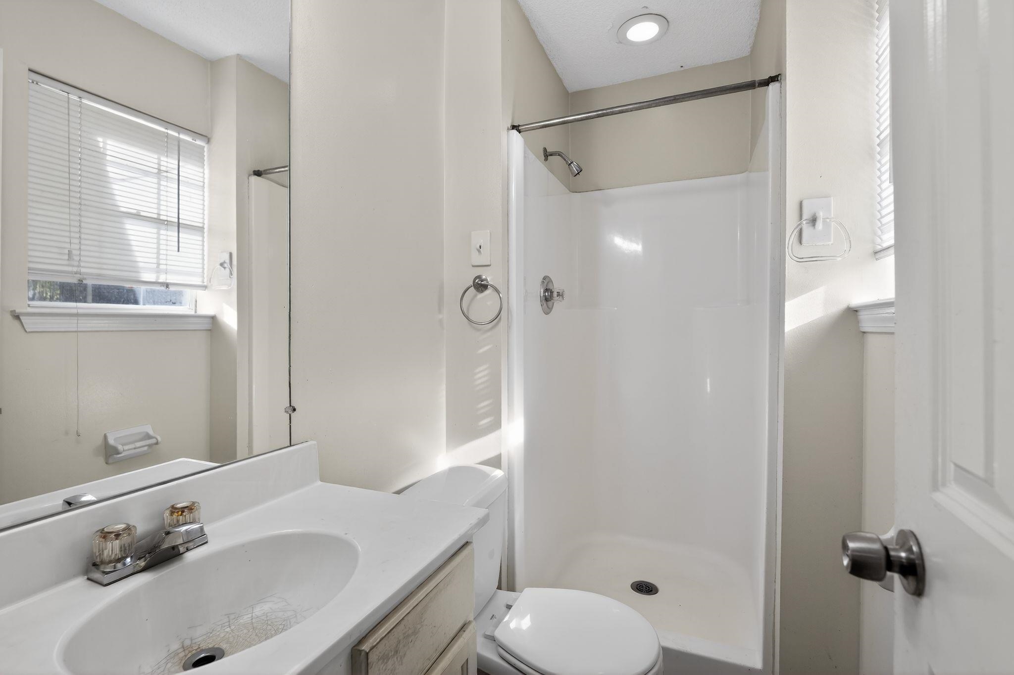 3820 Clarke Road Memphis, TN 38115 - Photo 20 of 30 Full bathroom featuring vanity and a stall shower