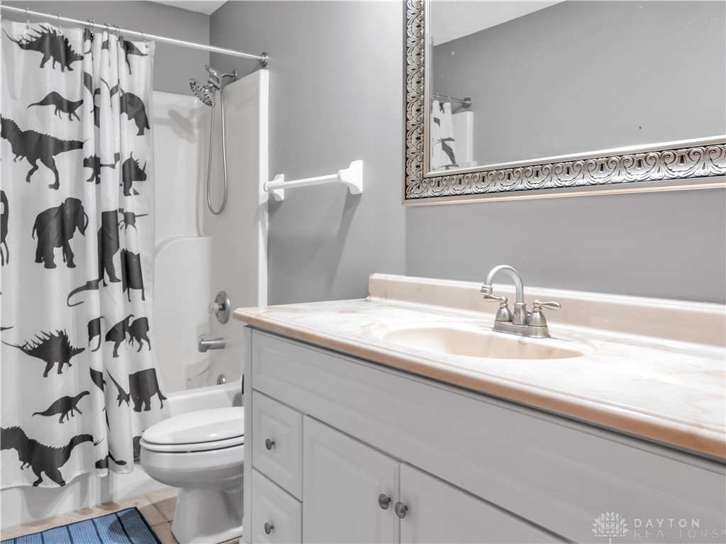 25 Callaway Springboro, OH 45066 - Photo 35 of 51 This bathroom features a sleek vanity with a classic faucet, and a refreshing shower.