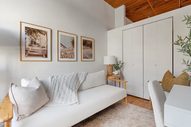 a living room with furniture and a couch