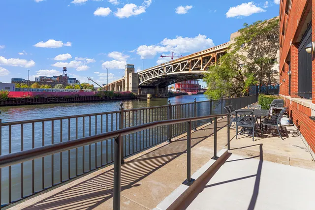 a view of a balcony with sitting area
