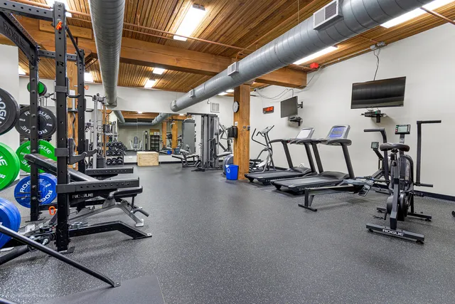 a view of a room with gym equipment