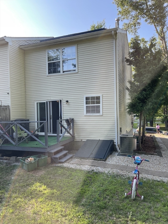 57 First Street Worcester, MA 01602 - Photo 23 of 26 a front view of a house with a yard