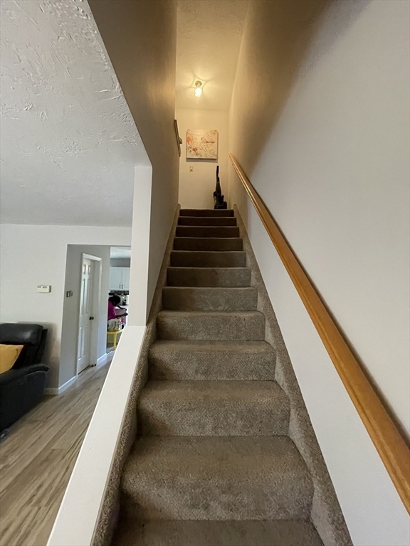 57 First Street Worcester, MA 01602 - Photo 8 of 26 a view of entryway and hall