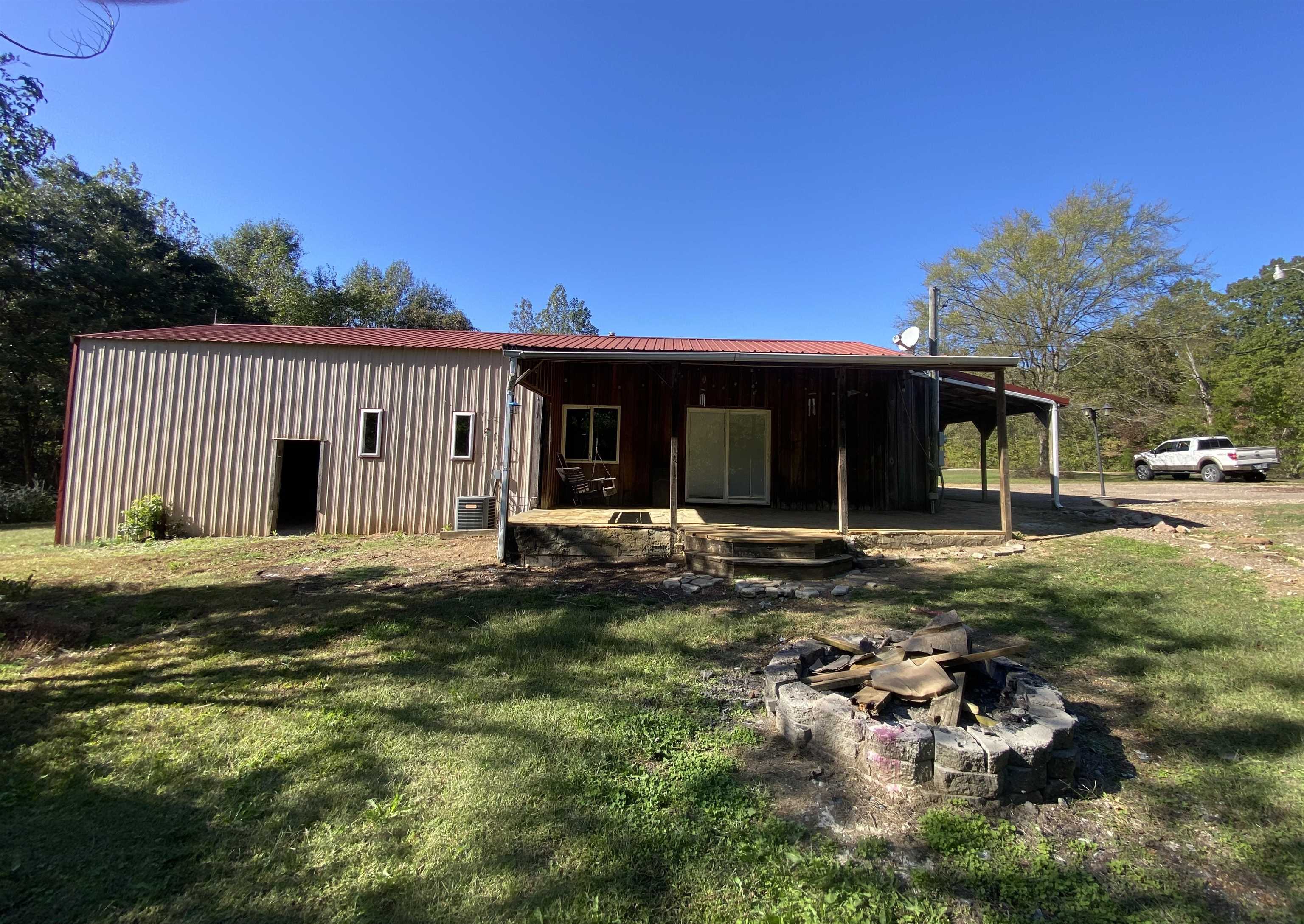 5610 Leapwood Enville Road Adamsville, TN 38310 - Photo 19 of 27 a view of a house with a yard