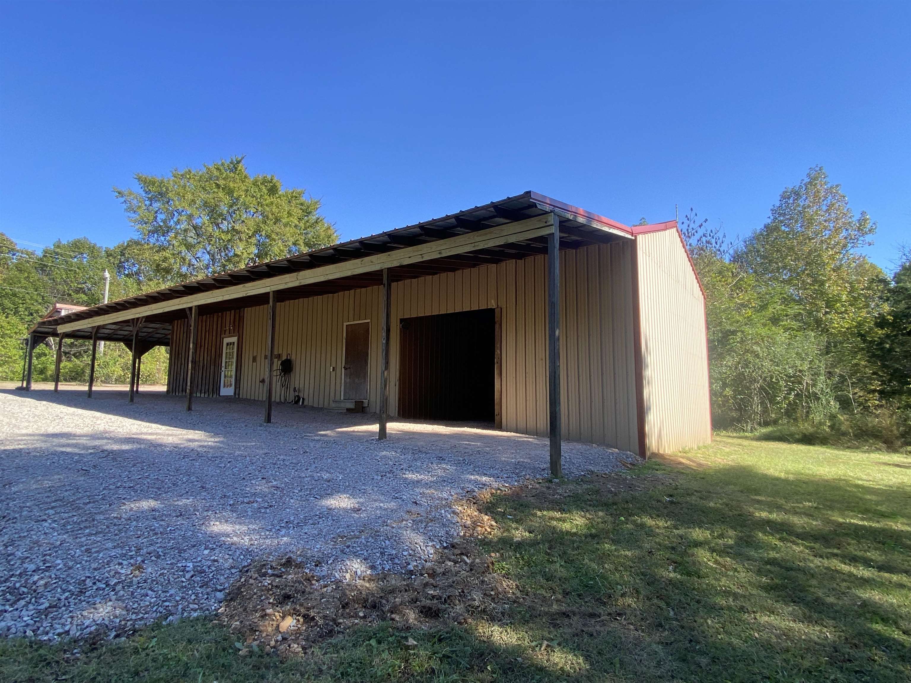5610 Leapwood Enville Road Adamsville, TN 38310 - Photo 4 of 27 a view of house with backyard and entertaining space