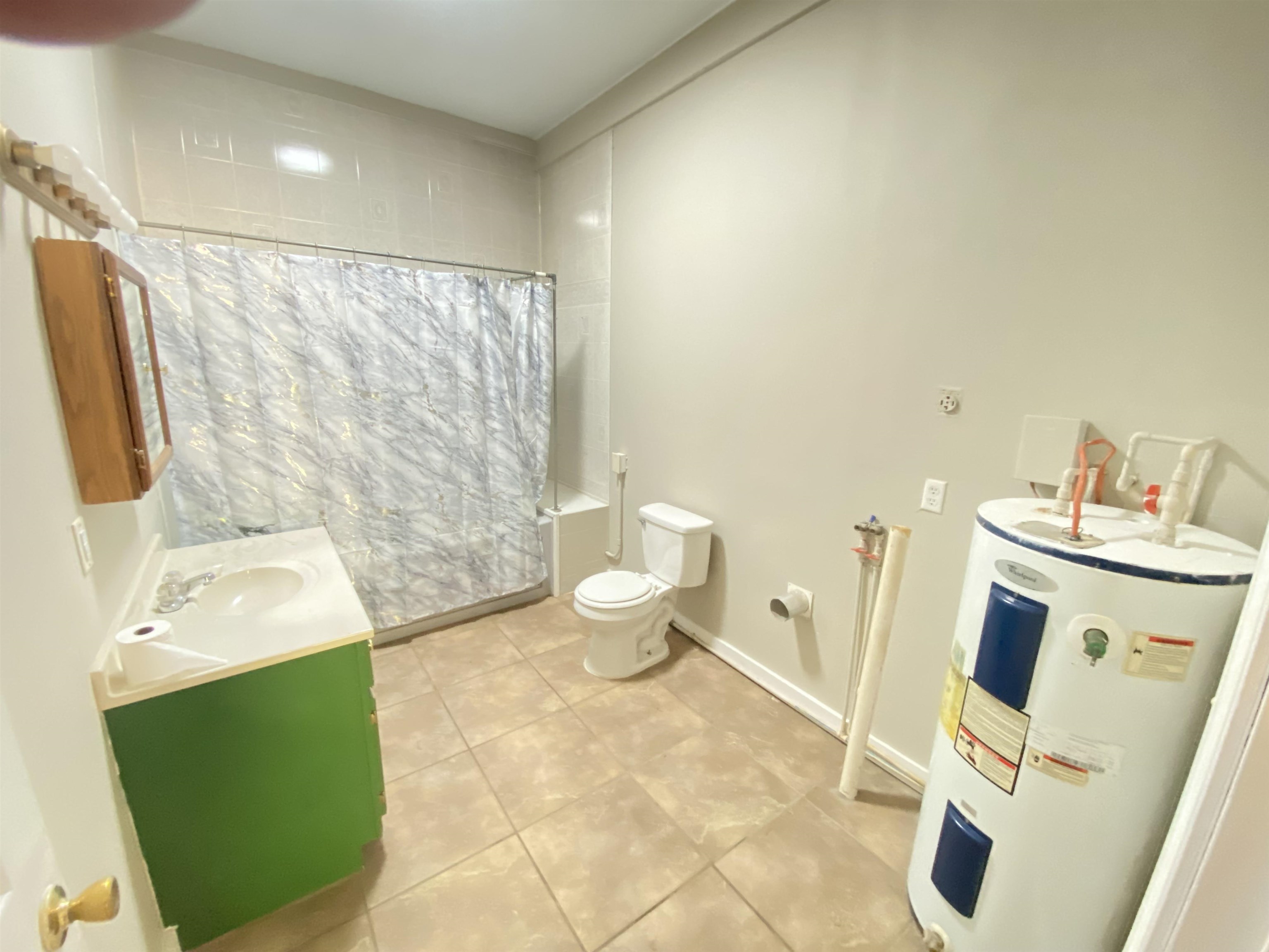 5610 Leapwood Enville Road Adamsville, TN 38310 - Photo 9 of 27 a bathroom with a sink and a mirror