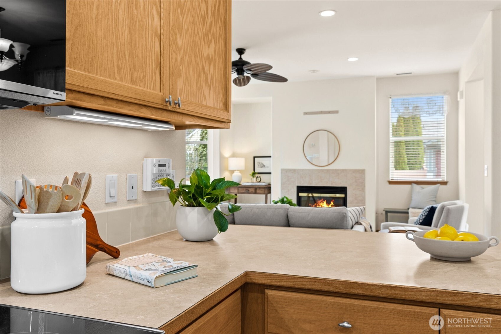 8232 Bainbridge Loop Northeast Lacey, WA 98516 - Photo 11 of 37 a kitchen with a refrigerator and a sink