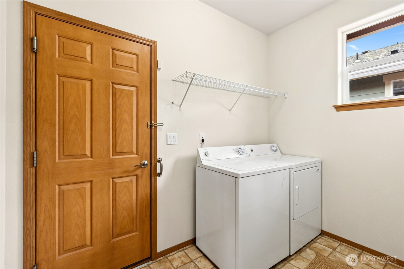 8232 Bainbridge Loop Northeast Lacey, WA 98516 - Photo 16 of 37 a utility room with dryer and washer