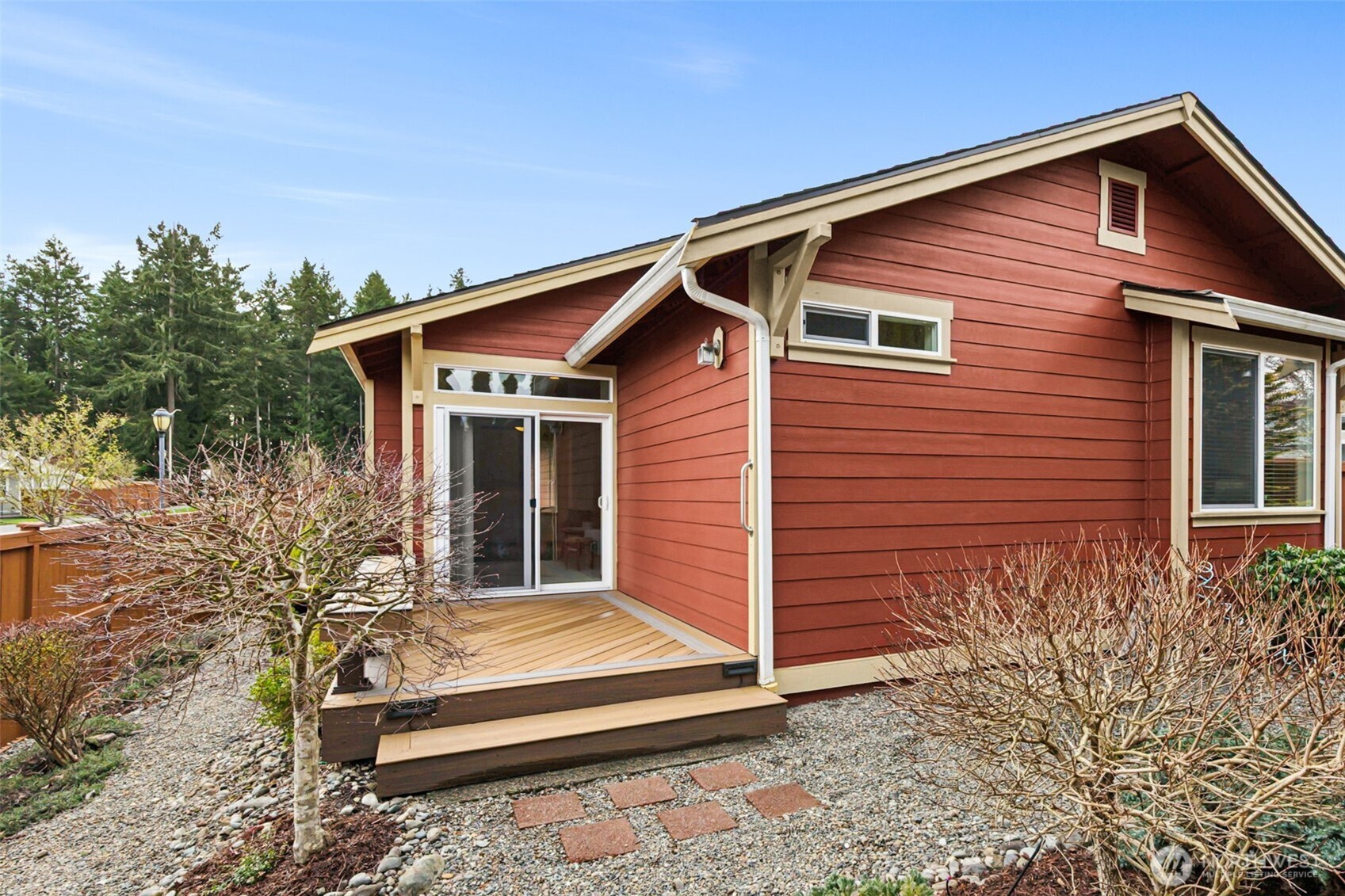 8232 Bainbridge Loop Northeast Lacey, WA 98516 - Photo 20 of 37 a front view of a house with a yard