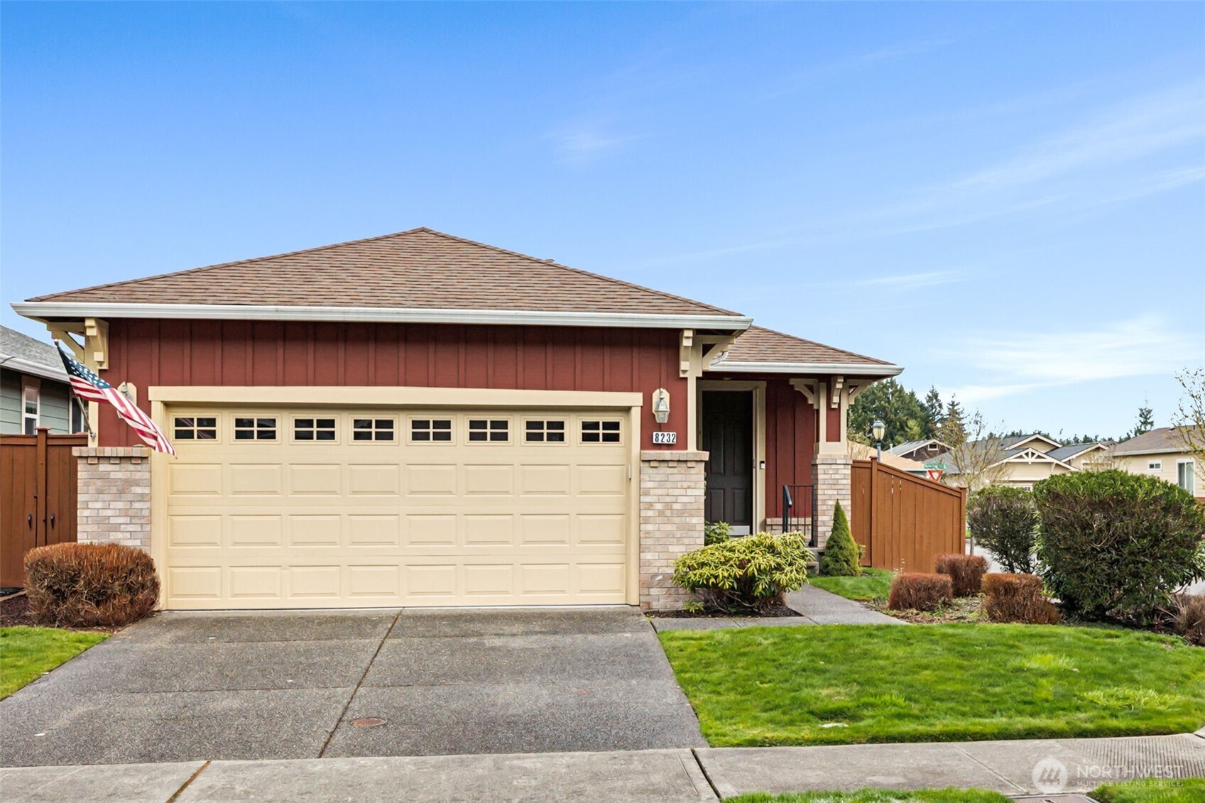 8232 Bainbridge Loop Northeast Lacey, WA 98516 - Photo 21 of 37 a front view of a house with a yard