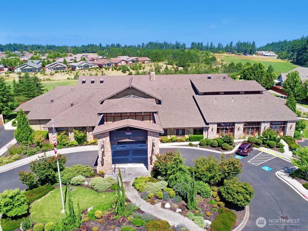 8232 Bainbridge Loop Northeast Lacey, WA 98516 - Photo 23 of 37 an aerial view of a house with a garden