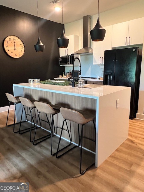 112 Rogers Street Southeast, Unit 504 Atlanta, GA 30307 - Photo 13 of 14 a kitchen with a table chairs and a view of living room