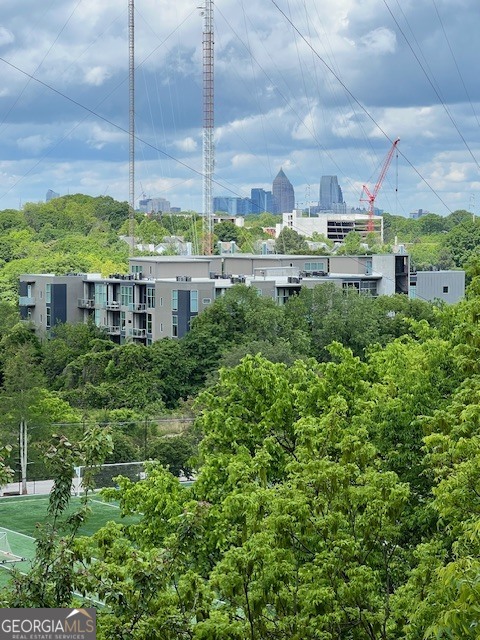 112 Rogers Street Southeast, Unit 504 Atlanta, GA 30307 - Photo 4 of 14 a view of a city with tall buildings