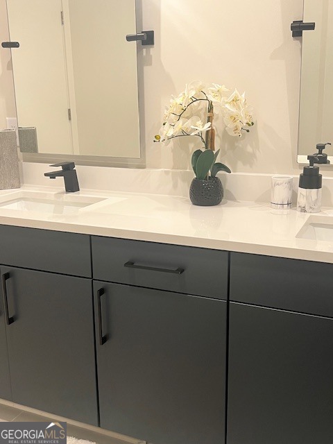 112 Rogers Street Southeast, Unit 504 Atlanta, GA 30307 - Photo 5 of 14 a bathroom with a sink and vanity