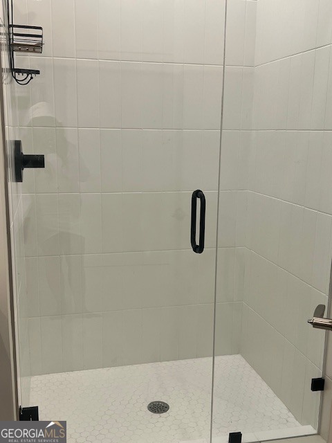 112 Rogers Street Southeast, Unit 504 Atlanta, GA 30307 - Photo 6 of 14 a bathroom with a shower