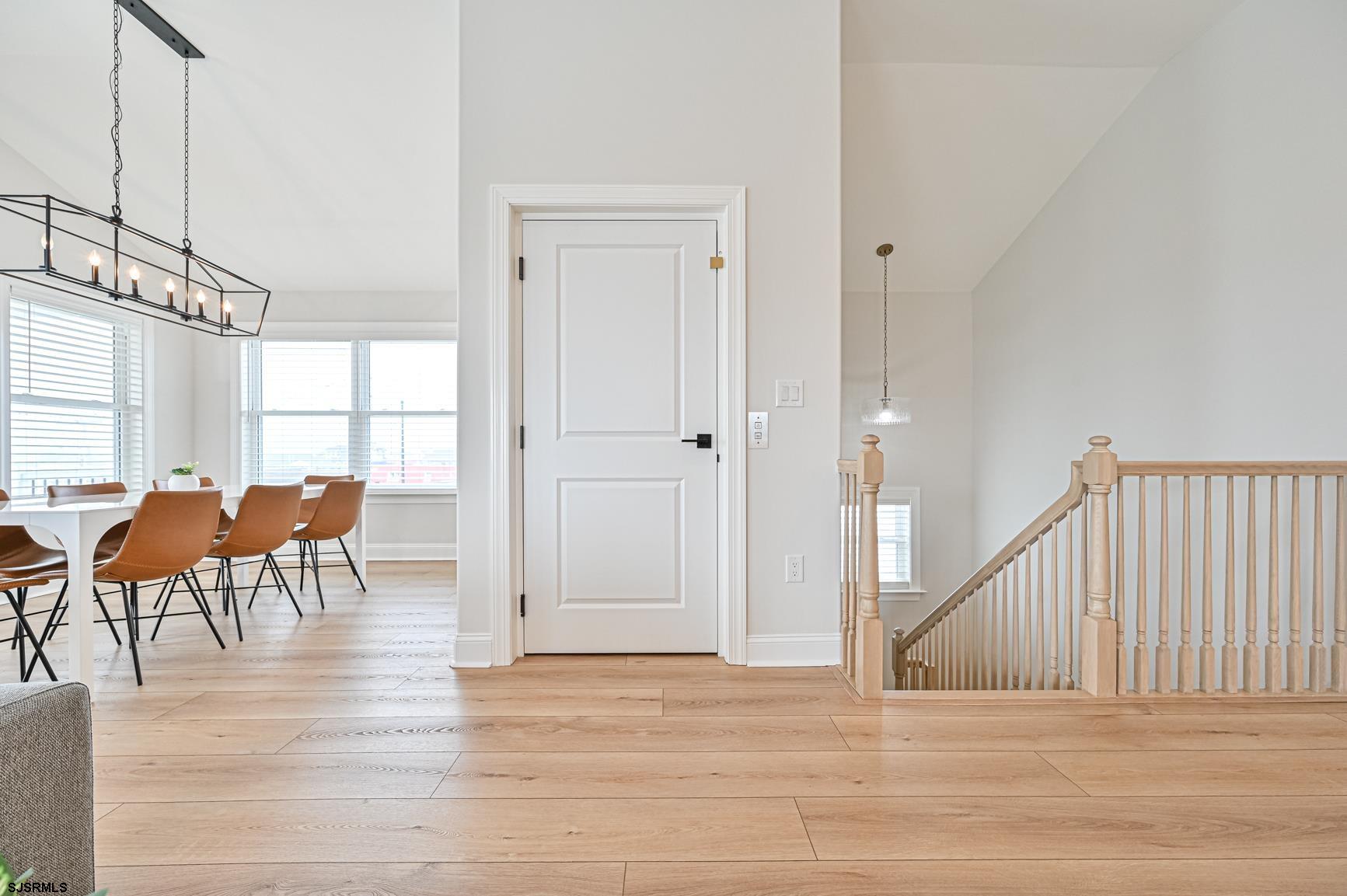 251 38th Street South Brigantine, NJ 08203 - Photo 19 of 63 a view of a dining room with furniture and a table