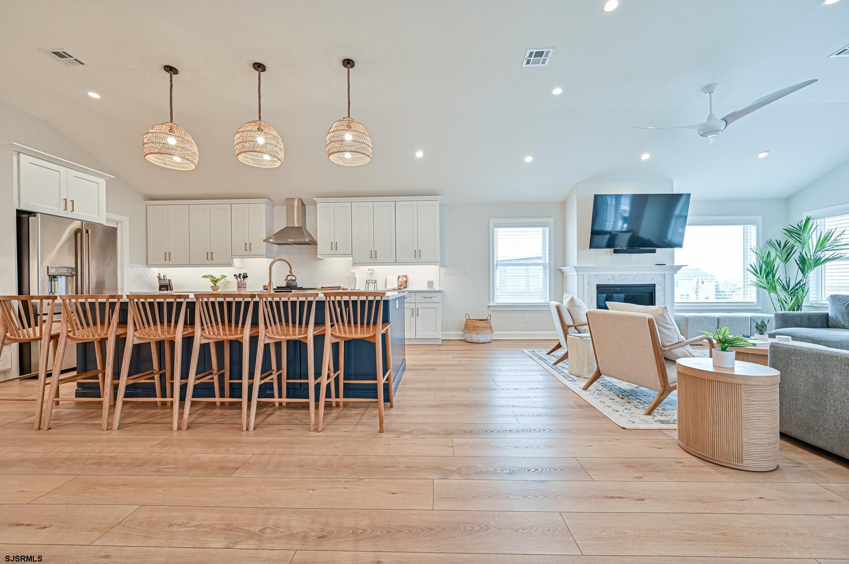 251 38th Street South Brigantine, NJ 08203 - Photo 22 of 63 a large kitchen with lots of counter space and furniture