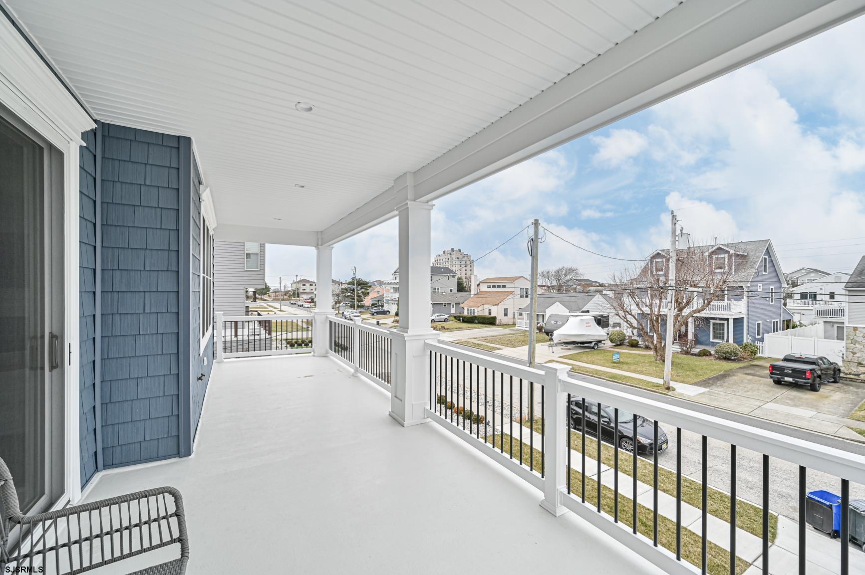 251 38th Street South Brigantine, NJ 08203 - Photo 31 of 63 a view of a living room and a balcony