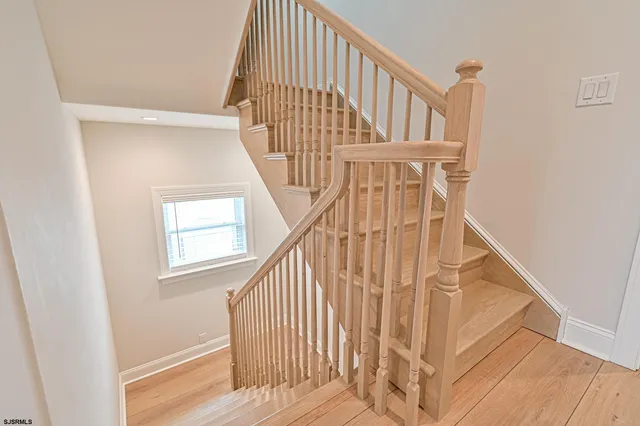 a bedroom with a bed and a fireplace