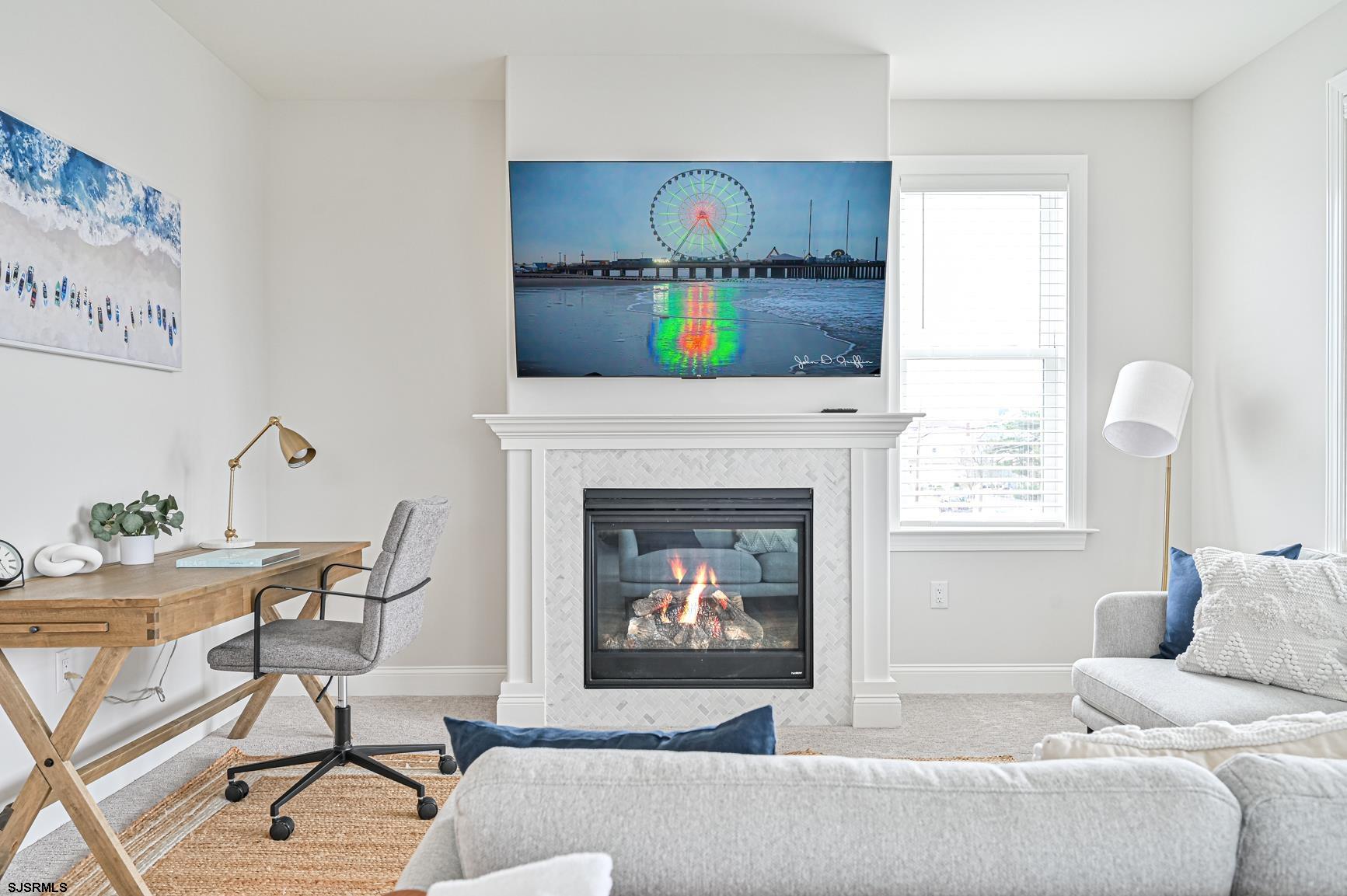 251 38th Street South Brigantine, NJ 08203 - Photo 38 of 63 a living room with furniture and a fireplace