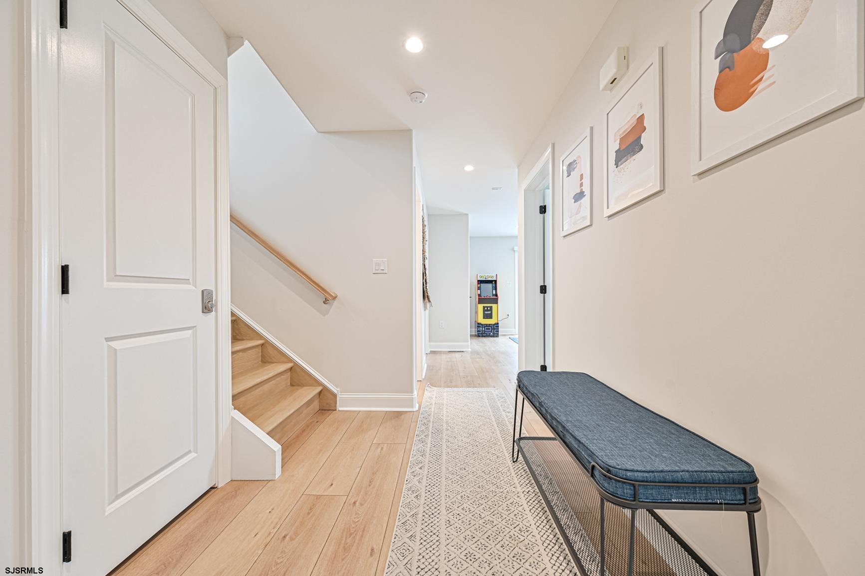 251 38th Street South Brigantine, NJ 08203 - Photo 61 of 63 a view of entryway and hall with wooden floor